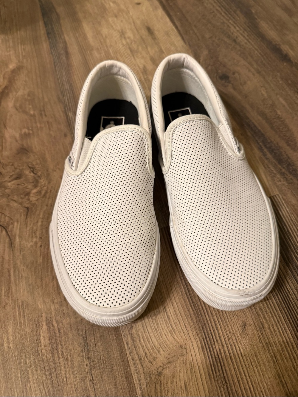 Vans White Perforated Slip-On Sneakers